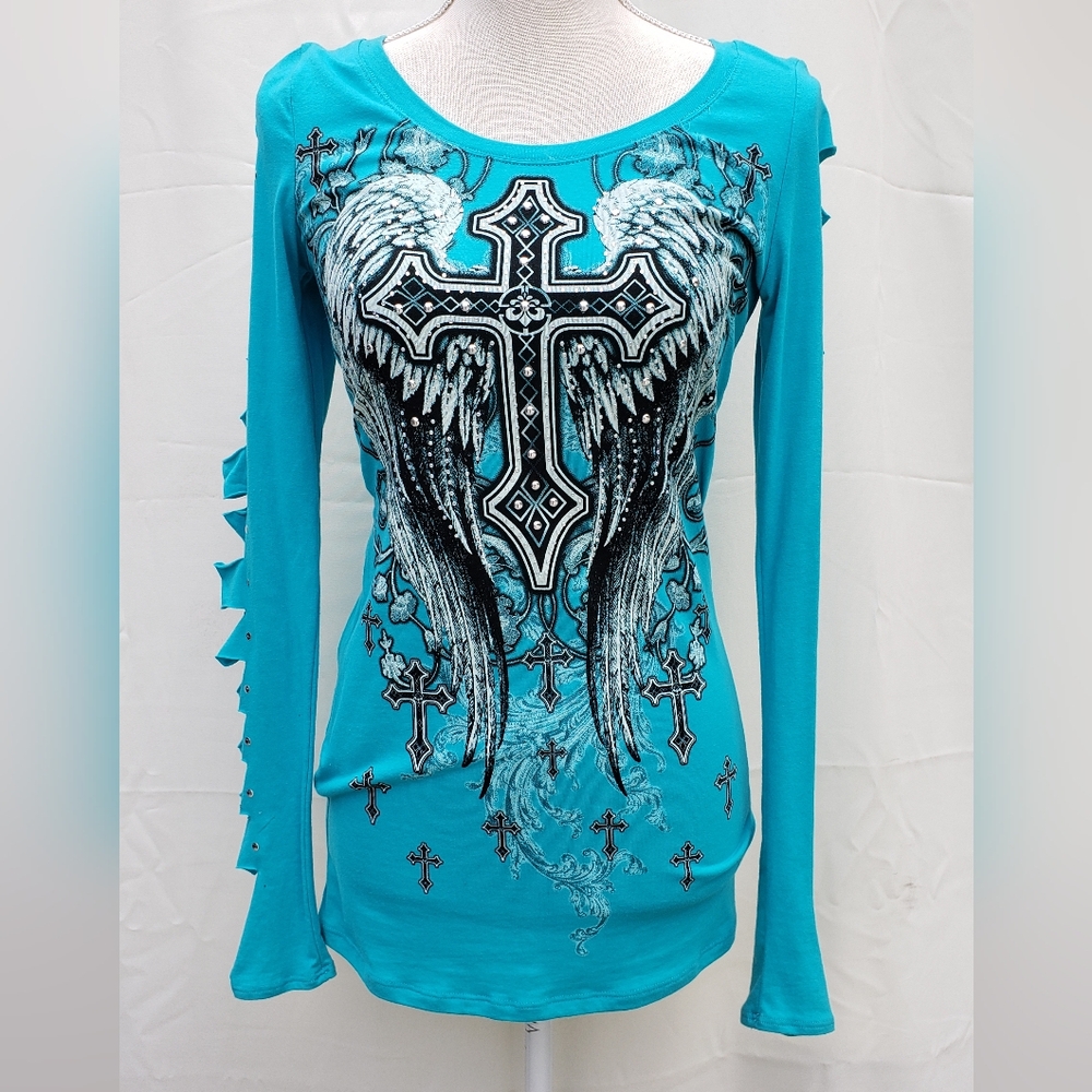 Turquoise long sleeve top with cutouts and metal studs on sleeves. Size L